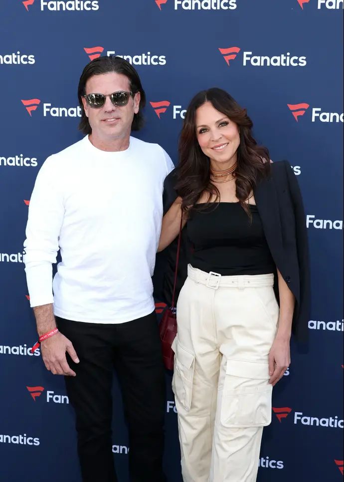 איש העסקים היהודי-אמריקאי דייויד אדלמן, עם אשתו האלי אדלמן