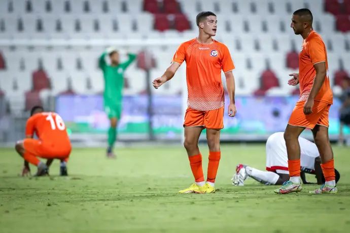 יובל ששון (מימין) עם אוהד אלמגור שחקני הפועל ראשון לציון