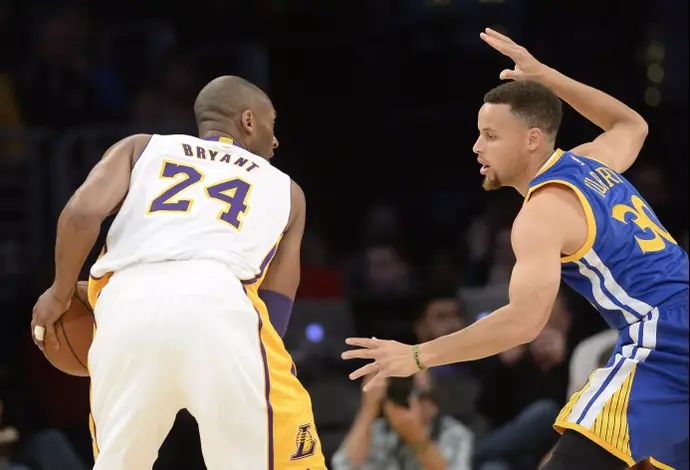 שחקן לוס אנג'לס לייקרס קובי בריאנט מול שחקן גולדן סטייט ווריירס סטפן קרי
