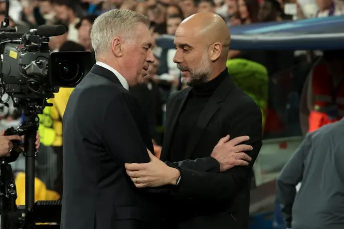 מאמן ריאל מדריד קרלו אנצ'לוטי עם מאמן מנצ'סטר סיטי פפ גווארדיולה