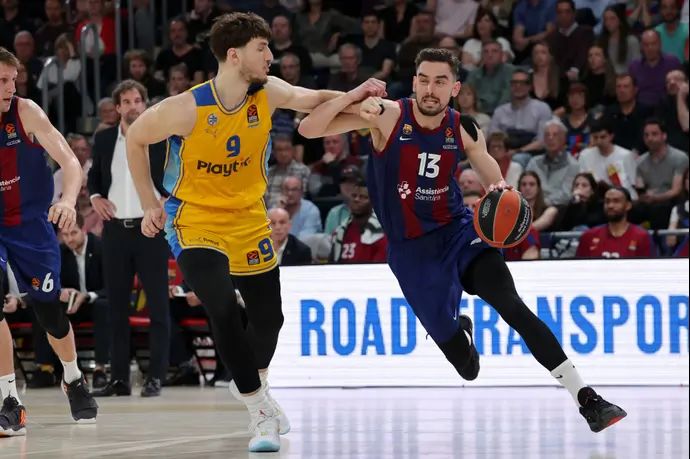 תומאש סטורנסקי שחקן ברצלונה מול רומן סורקין שחקן מכבי תל אביב