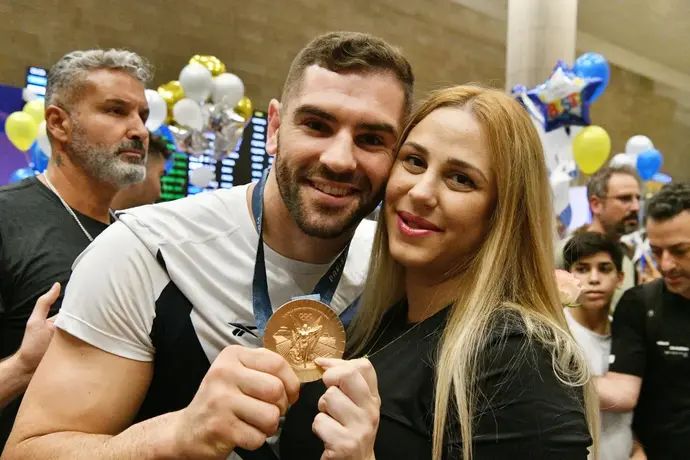 הג'ודוקא הישראלי פיטר פלצ'יק עם אשתו דניאל