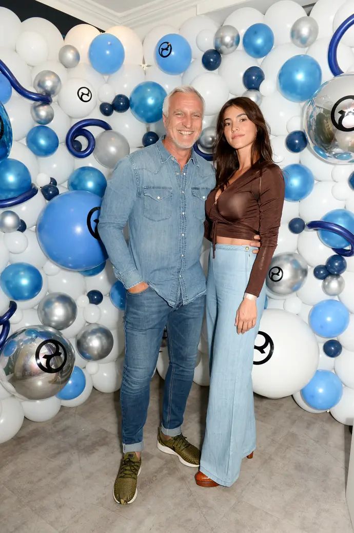 כדורגלן העבר דויד ג'ינולה לצד בת זוגו מיאבה דנא