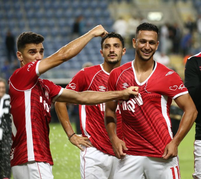 אילון אלמוג (מימין), גיא מזרחי, דן ביטון שחקני הפועל באר שבע