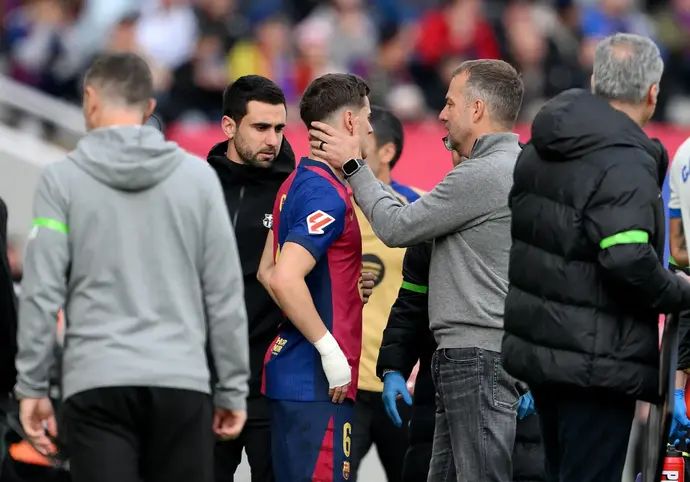 מאמן ברצלונה האנזי פליק עם גאבי