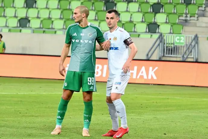 קיריל פרמודרוב שחקן טורפדו ז'ודינו מול ג'ורג'ה יובאנוביץ' שחקן מכבי חיפה