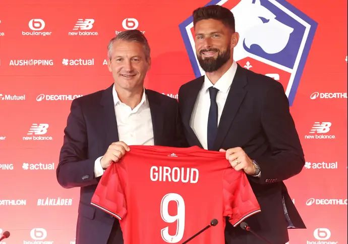 אוליבייה ז'ירו שחקן ליל עם נשיא המועדון אוליבייה לטאן