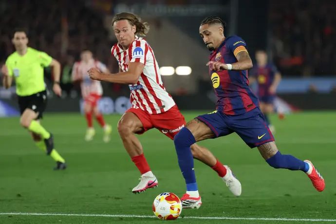 ראפיניה שחקן ברצלונה מול מרקוס יורנטה שחקן אתלטיקו מדריד