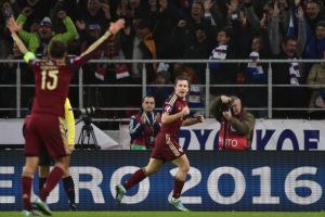 שחקני רוסיה חוגגים העפלה לפלייאוף