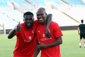 טוני וואקמה, ג'ון אוגו