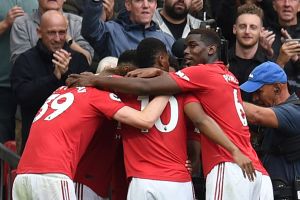 שחקני מנצ'סטר יונייטד חוגגים