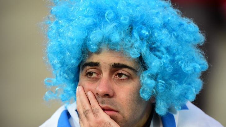 אוהד אורוגוואי מתוסכל. דרום אמריקה לא על המפה