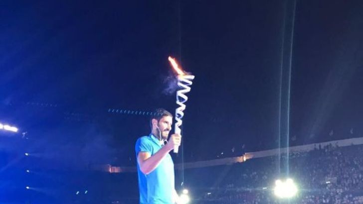 עומרי כספי מדליק משואה