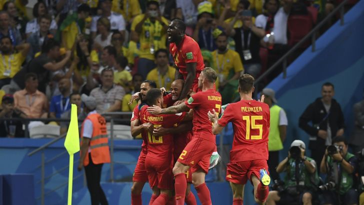 שחקני בלגיה חוגגים את היתרון ברבע הגמר