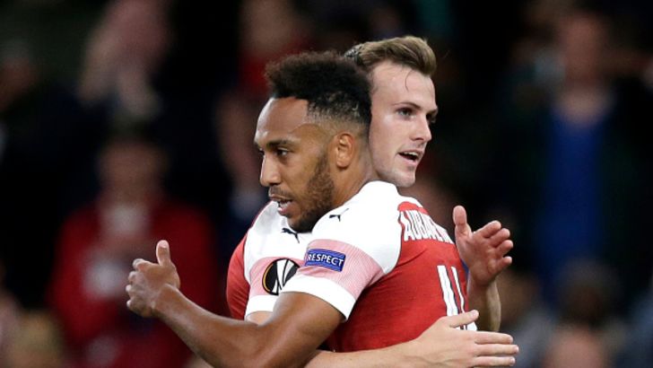 פייר-אמריק אובאמיינג עם רוב הולדינג