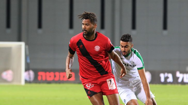 קווין טאפוקו עם מוחמד עוואד