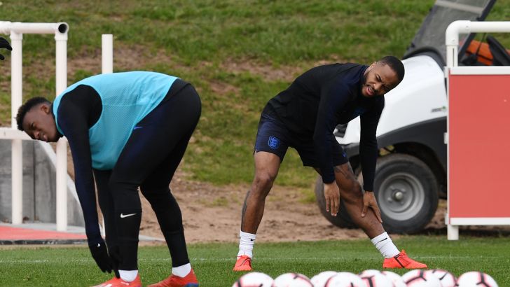 ראחים סטרלינג עם ג'יידון סאנצ'ו