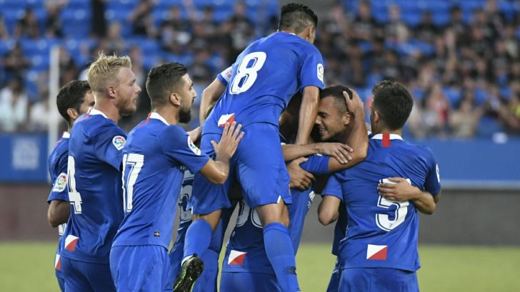 מואנס דאבור עם שחקני סביליה