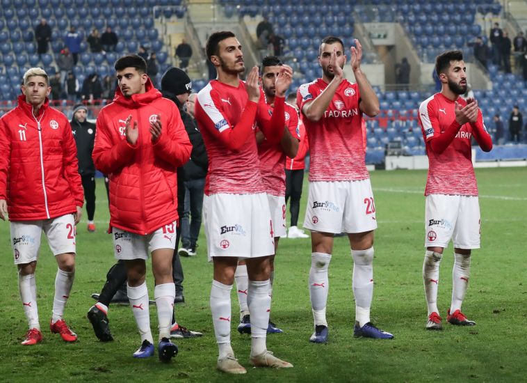 שחקני הפועל באר שבע. ליאם ביטון היתה אוהדת אדוקה (דני מרון)