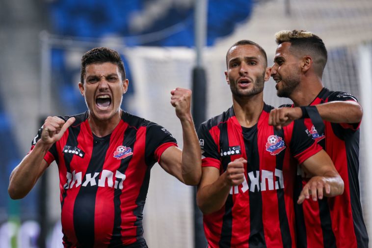 חזרו למשחק. שחקני הפועל חיפה חוגגים (מאור אלקסלסי)