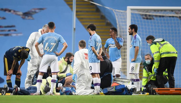 גרסיה מקבל טיפול. הפציעות העיבו על השמחה (PETER POWELL/POOL/AFP via Getty Images)
